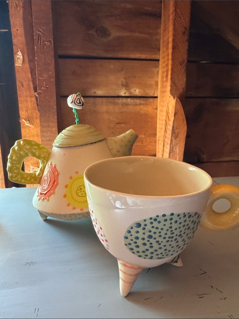 Handcrafted Ceramic Teacup and Teapot Set in Cream with Yellow Accents